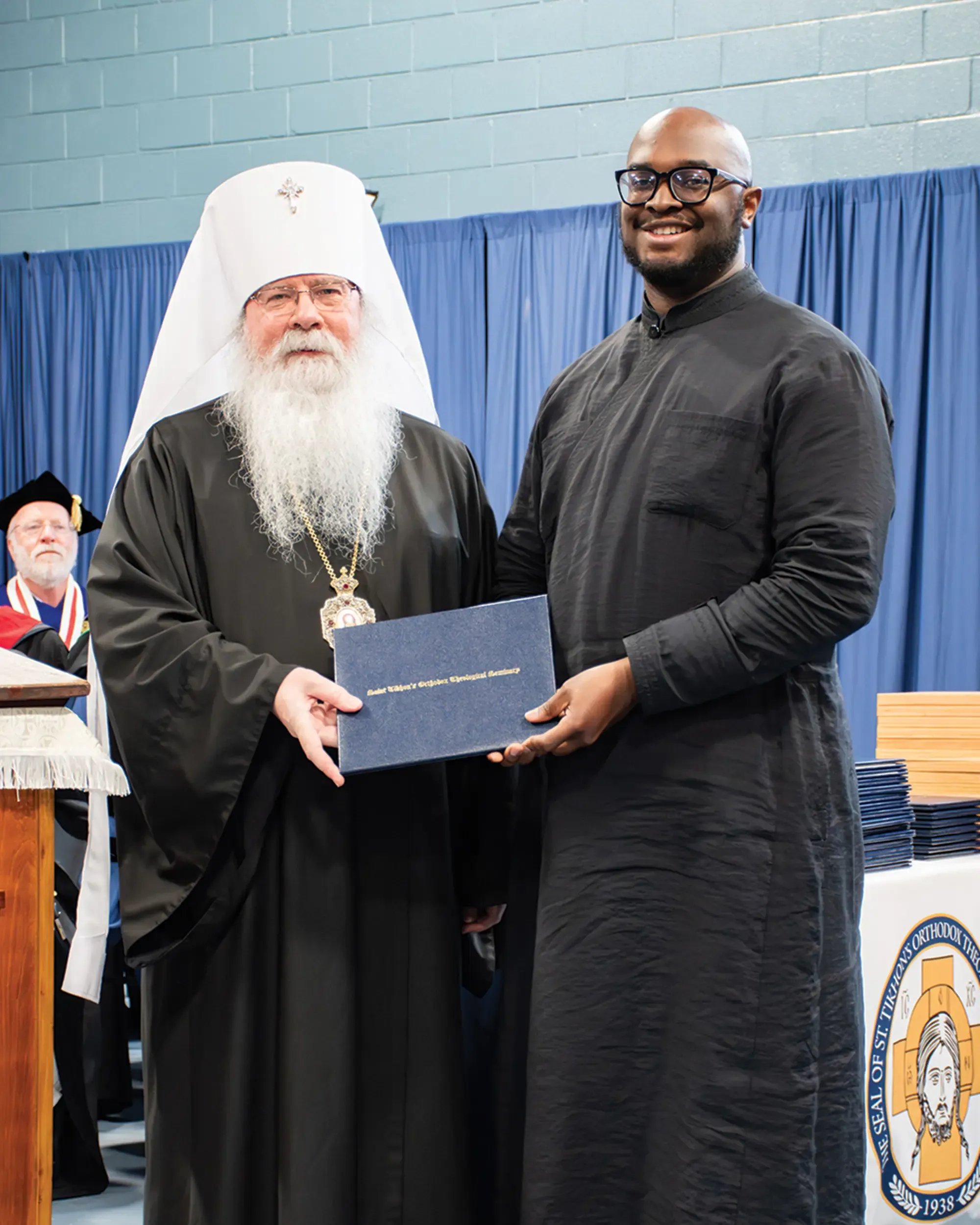 St. Tikhon's Seminary Academics Diaconal Formation Program graduate receiving certificate from Metropolitan Tikhon.