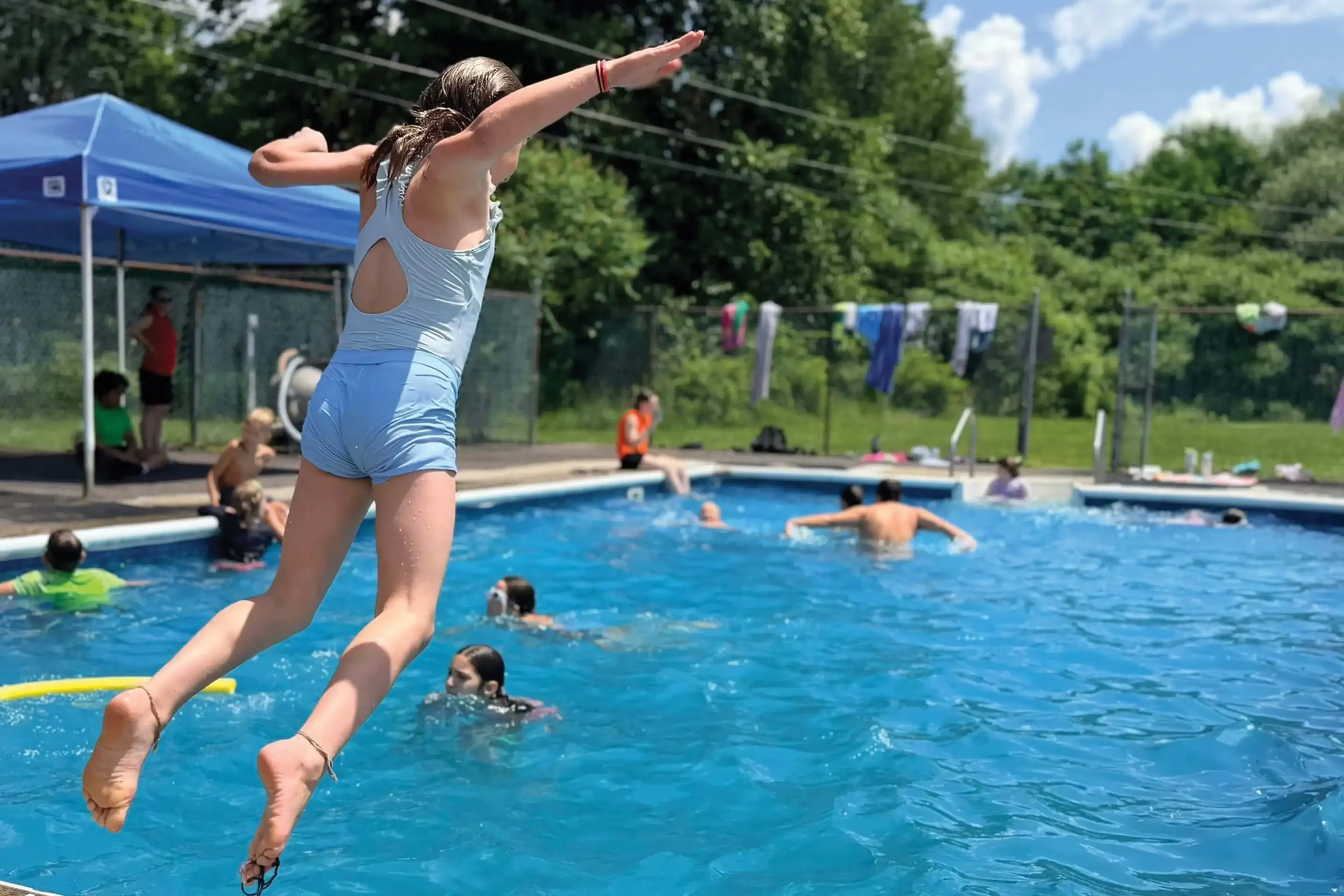 St. Tikhon's Seminary Community Exercise Facilities child jumping into swimming pool.