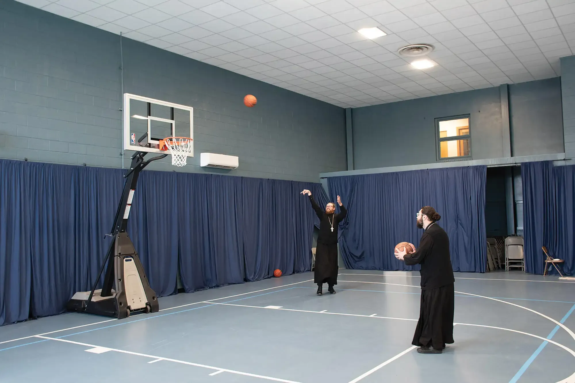 St. Tikhon's Seminary Community Exercise Facilities seminarians playing basketball.