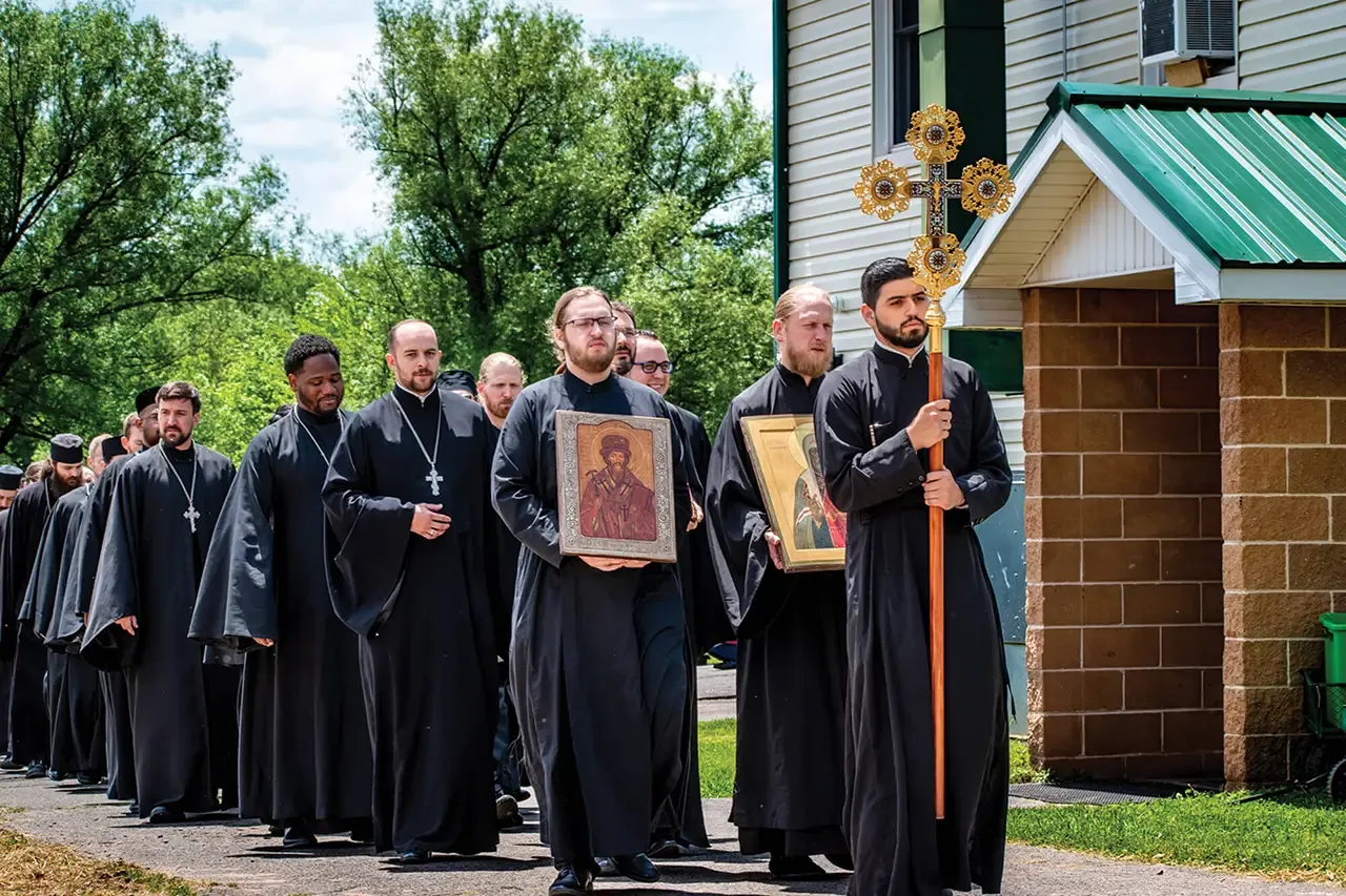 St. Tikhon's Seminary News seminarians processing with cross at commencement. 