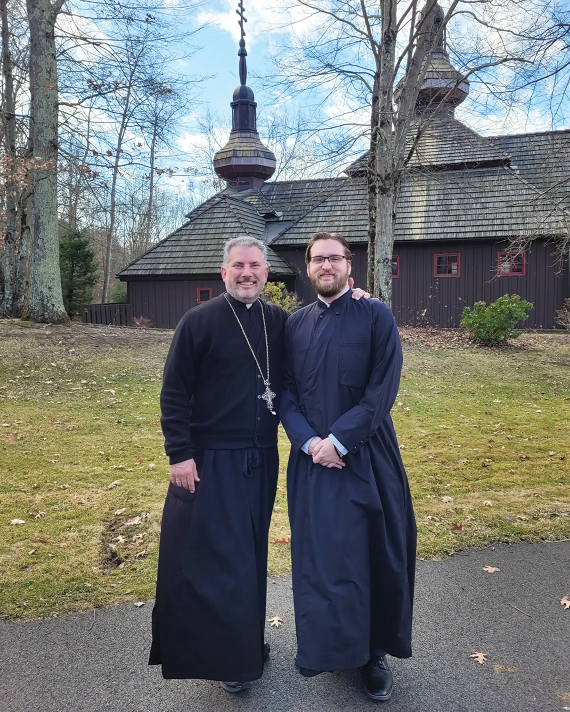 St. Tikhon's Seminary Stories Ignatius Leonardo and priest in front of a church.