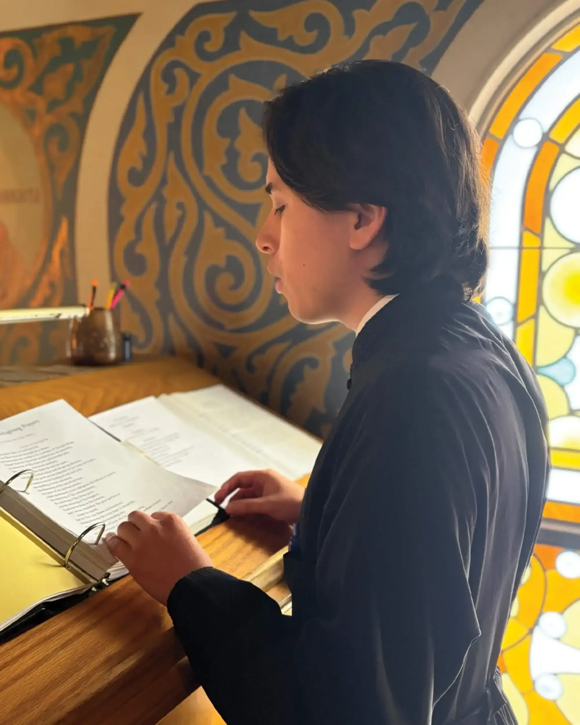 St. Tikhon's Seminary Stories Zacchaeus Resz reading at the chanter's stand.