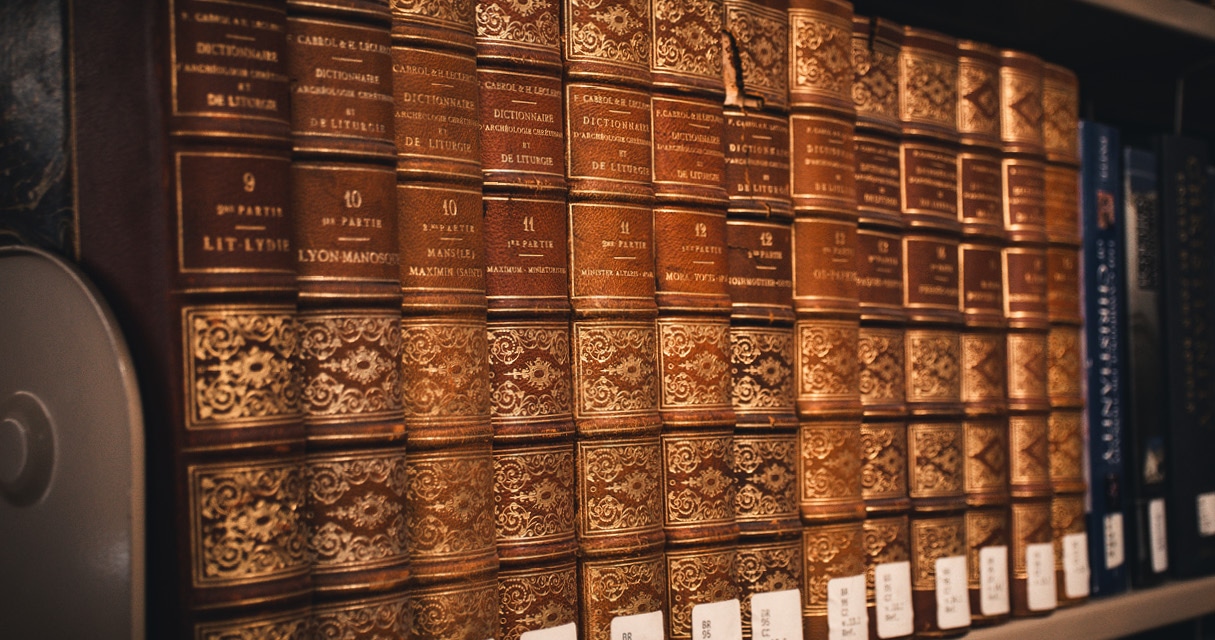 St. Tikhon's Seminary News & Events Now Hiring Professor of Church History old library books on shelf.