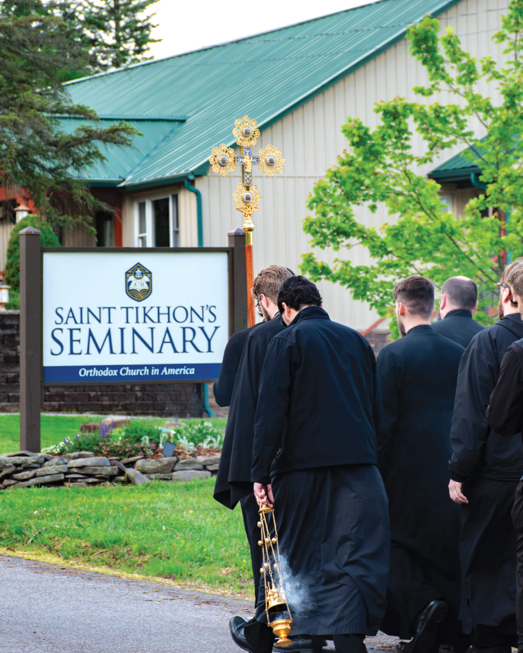St. Tikhon's Seminary Community seminarian processing with cross