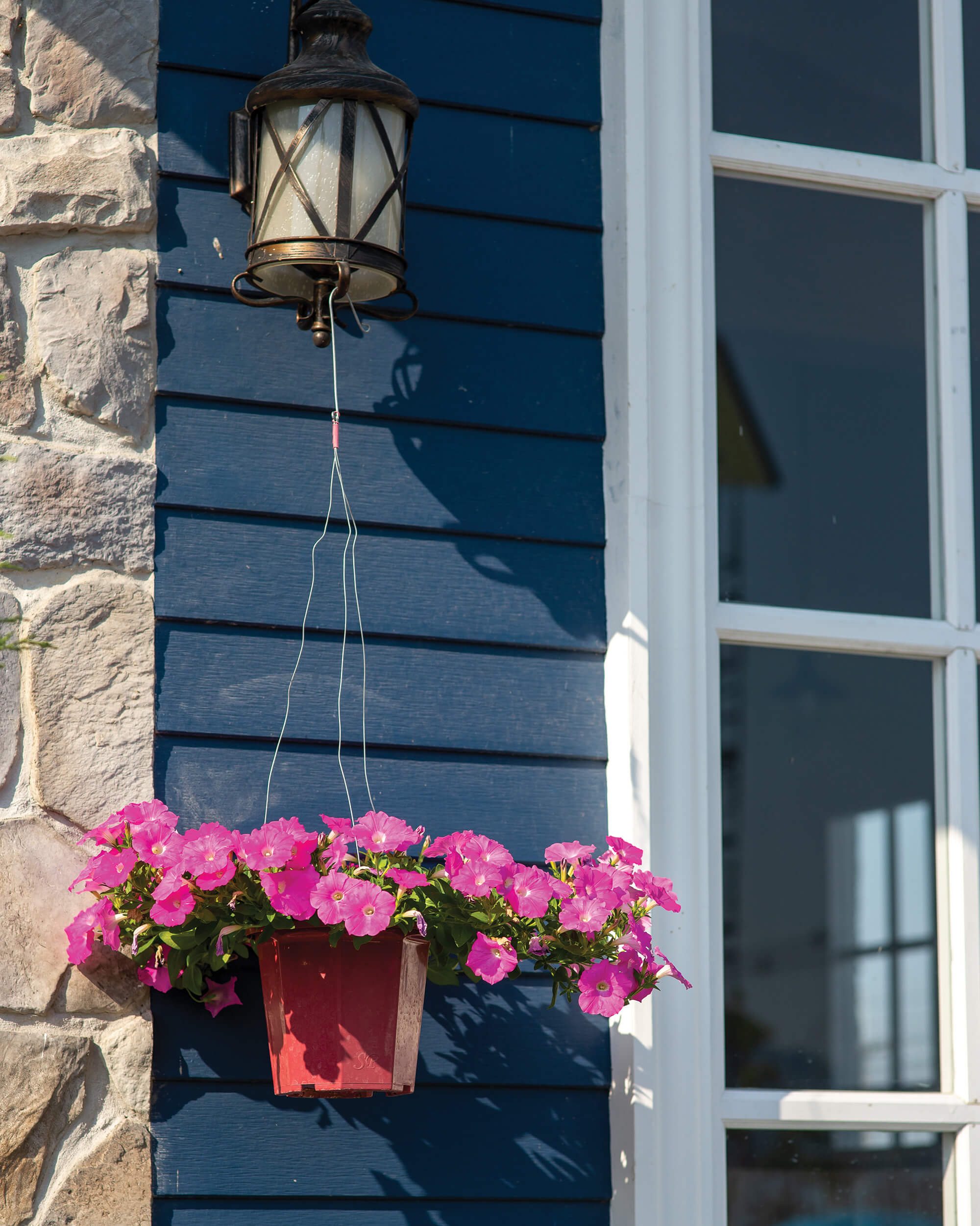 St. Tikhon's Seminary Community Housing closeup of house window and flowers.