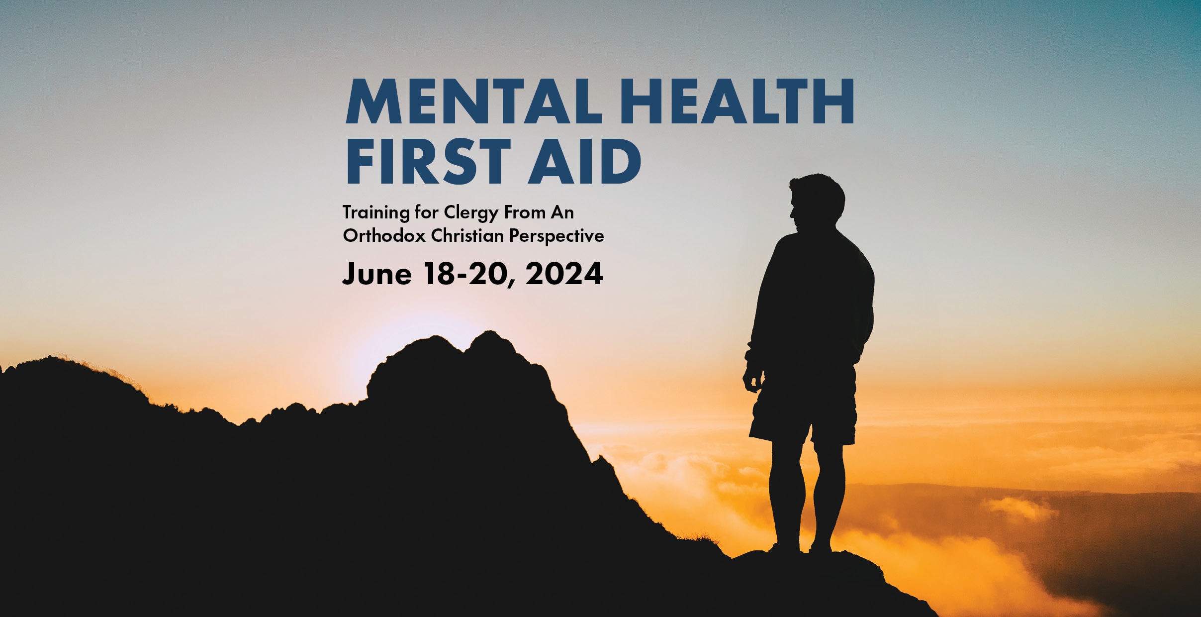 St. Tikhon's Seminary News & Events Mental Health First Aid Clergy Retreat man standing atop a mountain at sunset.