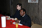 Paul Drake and Elias Mukasa enjoy dinner.